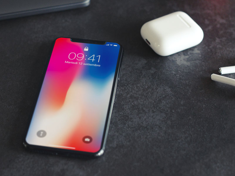 Download iPhone X with Earphones and Laptop PSD Mockup | MockupsQ