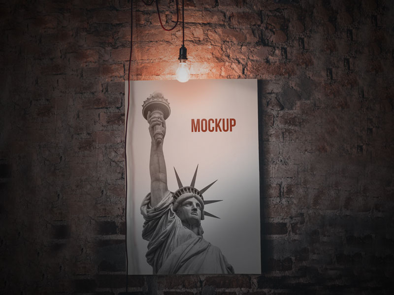 Download Poster in Dim Light with Bulb PSD Mockup | MockupsQ