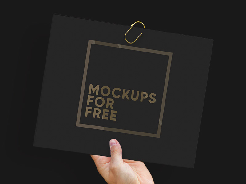 Hand Holding Paper PSD Mockup