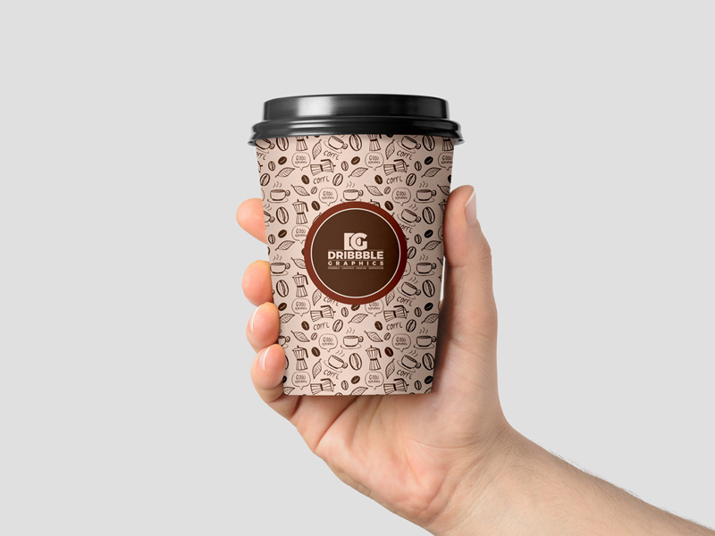 Male Hand Holding Coffee Cup PSD Mockup