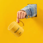 Cup with Hand PSD Mockup